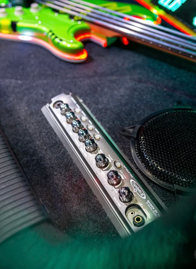 Stuart Hammond’s 2016 Audi A3 S line Sportback 2.0L TDI, with Air Lift Performance 3P, an air tank, and an Airguitar and a built-in fully functional Line6 guitar amp and hardline pipes positioned to look like guitar strings.